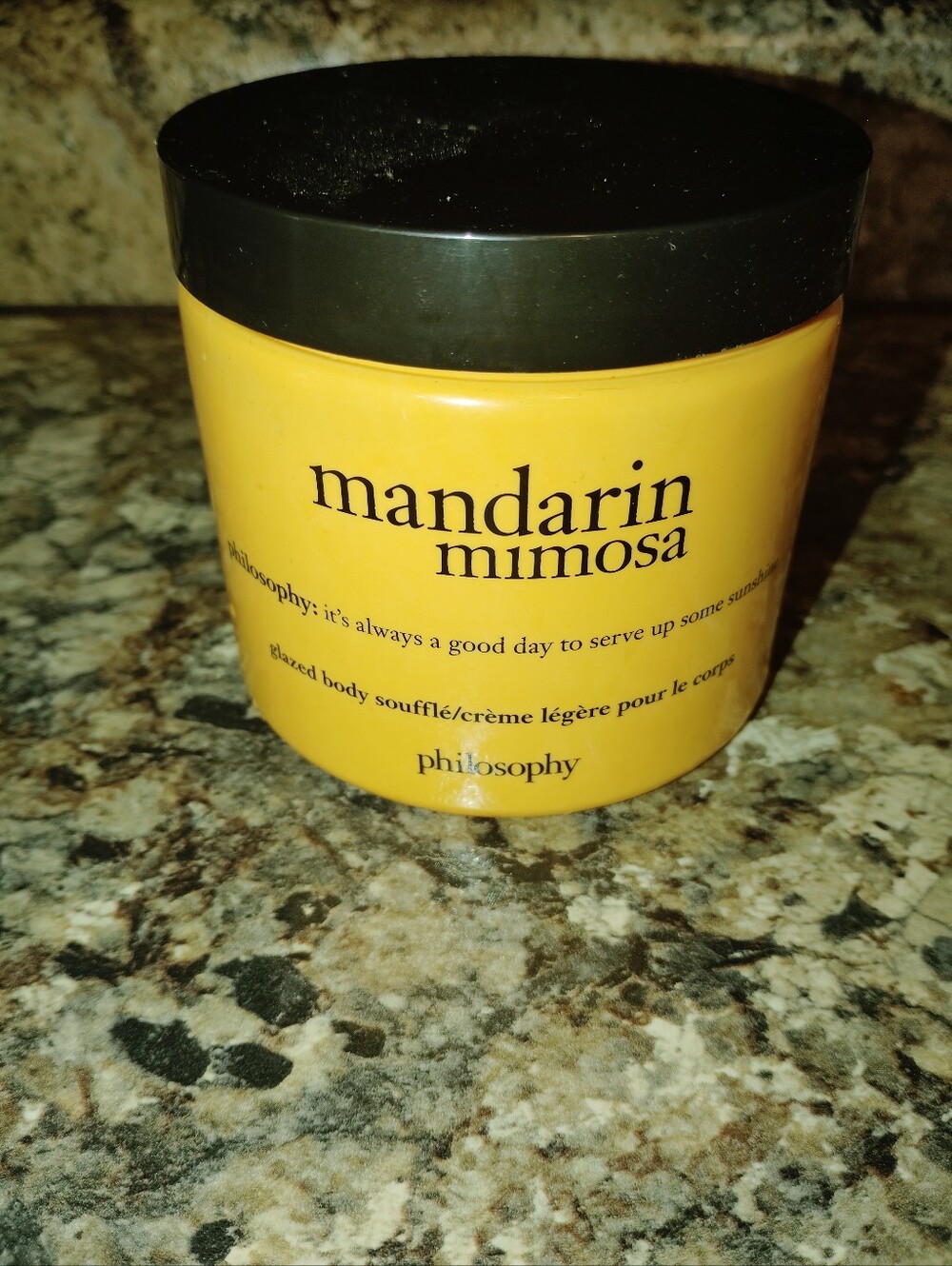 The item pictured is the Philosophy Mandarin Mimosa Glazed Body Soufflé.​New